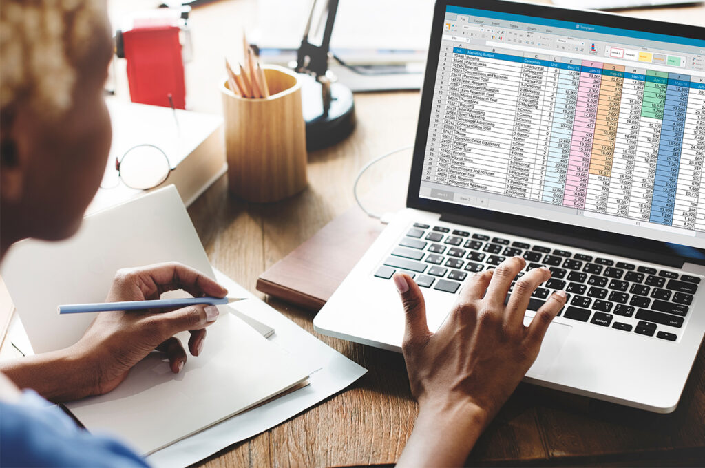 a sole trader going through their expenses in a spreadsheet
