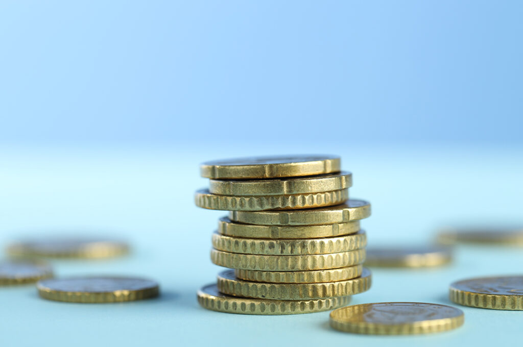 a closeup of a stack of coins representing tax efficient investments