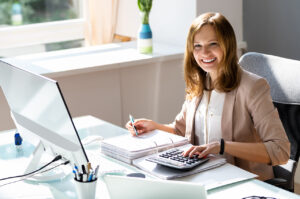 a smiling accountant answering a clients question - do limited companies need an accountant